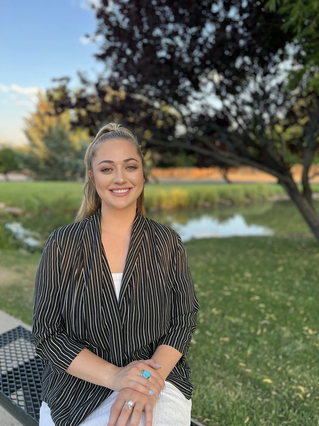 Cassandra Monroe, LCSW, LCADC, seated outdoors in Reno, Nevada