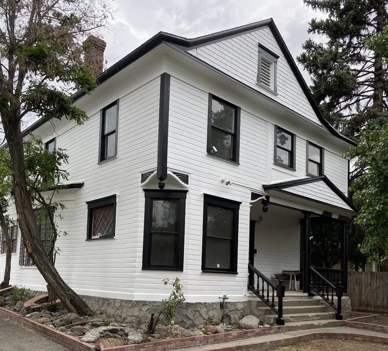 The Connecting Couples office at 537 Ralston Street in Reno, a white house with black trim